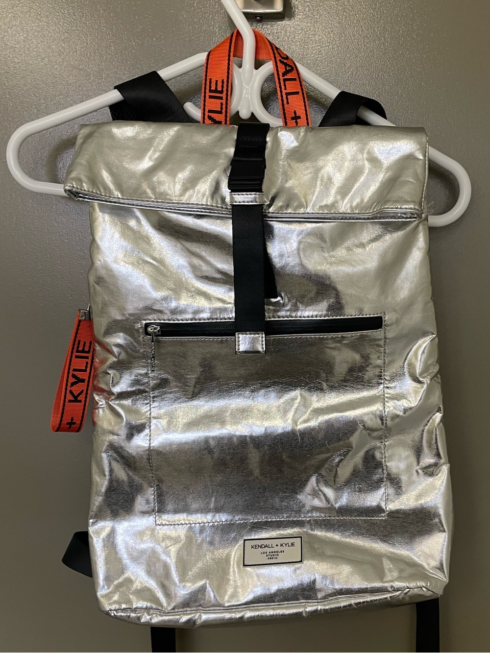 Kendall & Kylie Silver Metallic Backpack with Orange Accents